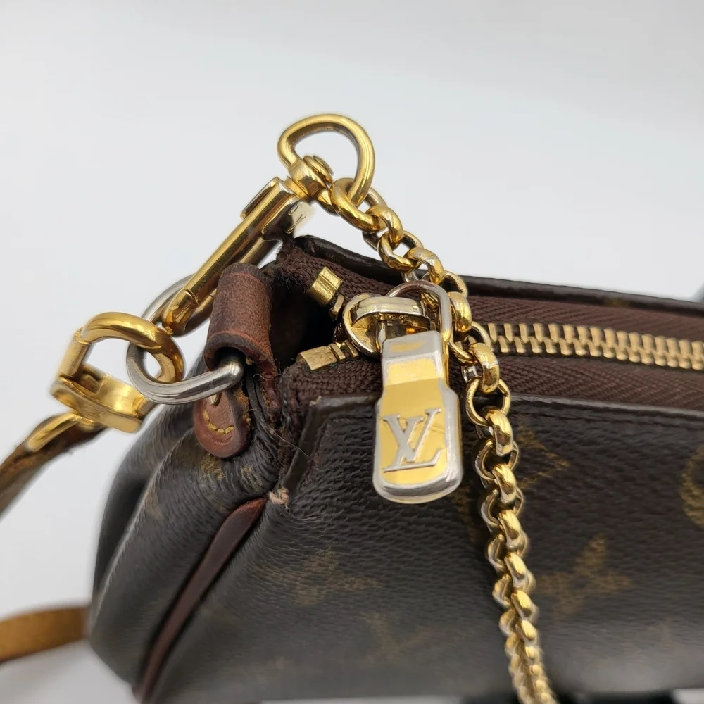 LOUIS VUITTON Eva Monogram Leather Pochette Bag..Authentic..